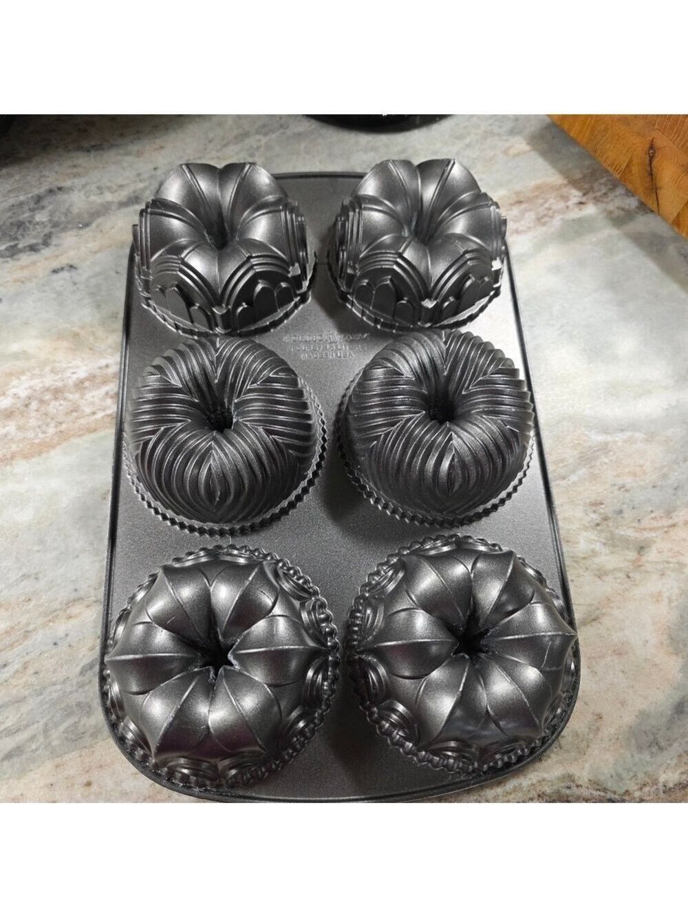 Nordic Ware Bundt Quartet Pan - 6 Cup Cast Aluminum Multi-Design Cake Pan
